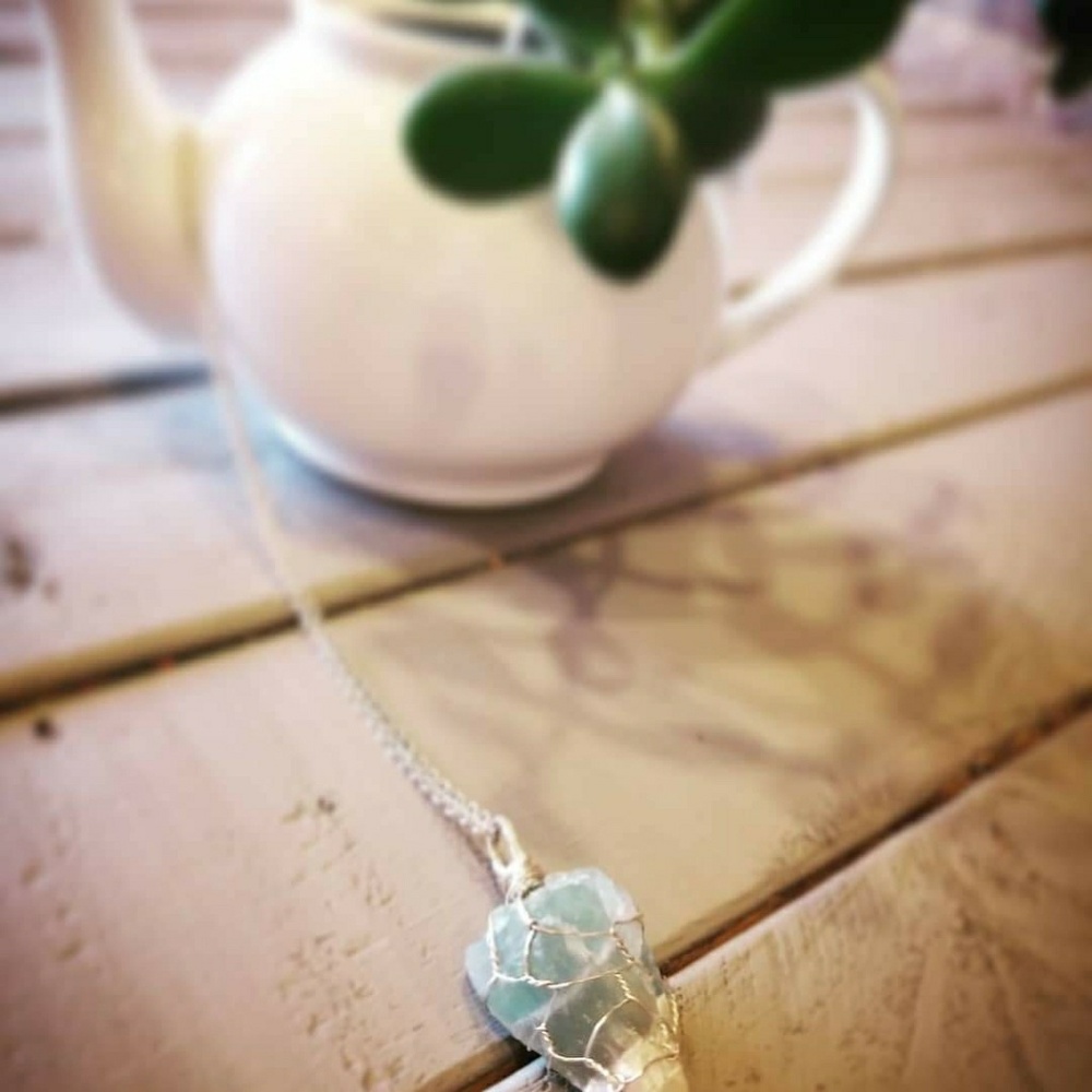 Fluorite crystal wrapped in Sterling silver